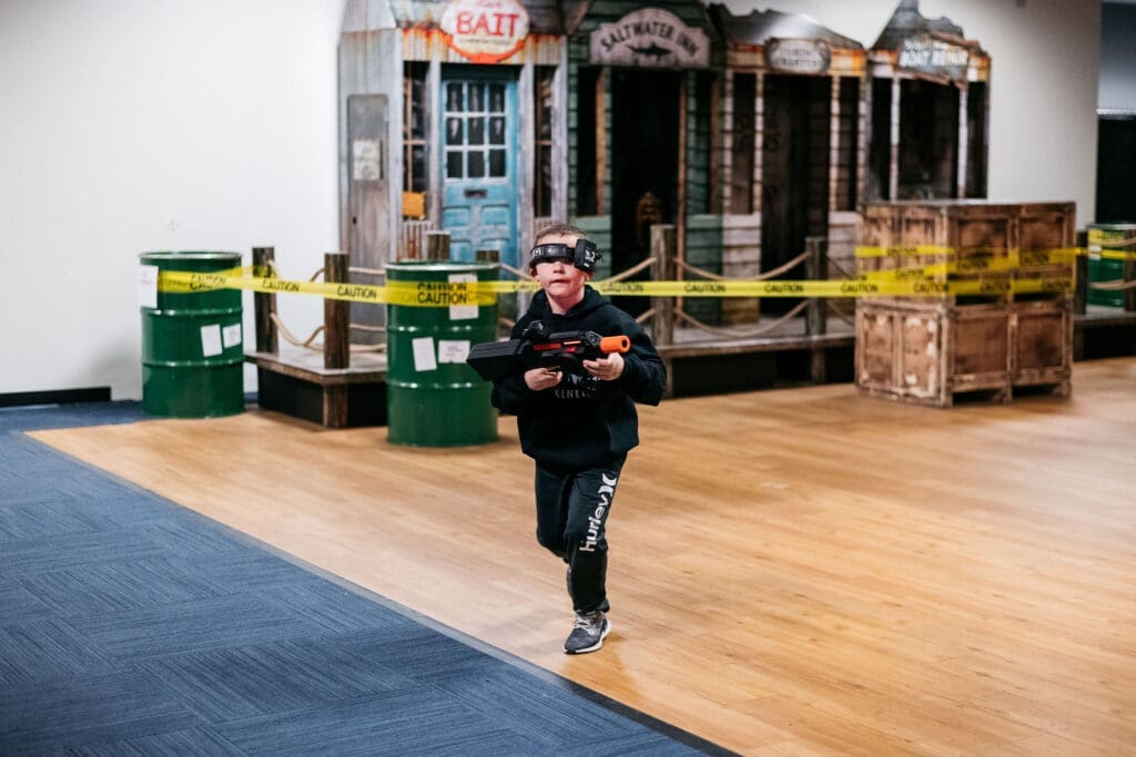 "Team strategy and adrenaline come together in an immersive laser tag adventure."