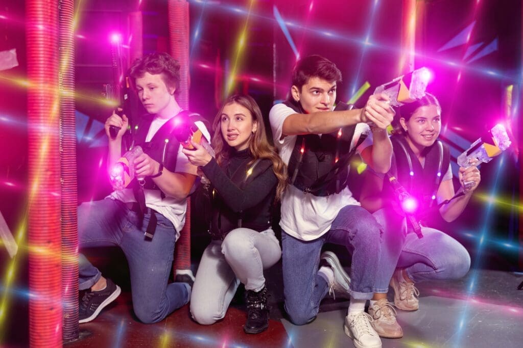 Ordinary,Laser,Tag,Players,Young,Mens,And,Womens,Playing,In